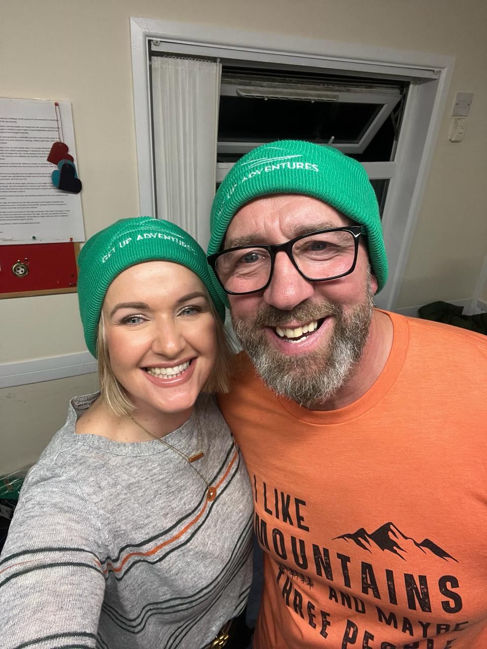 Cara and John in their green Get Up Adventures beanies