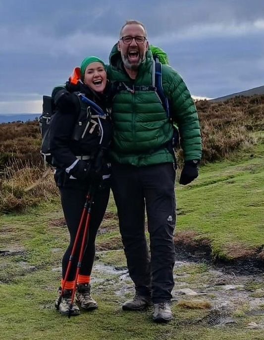 John and Cara on the trail with full packs