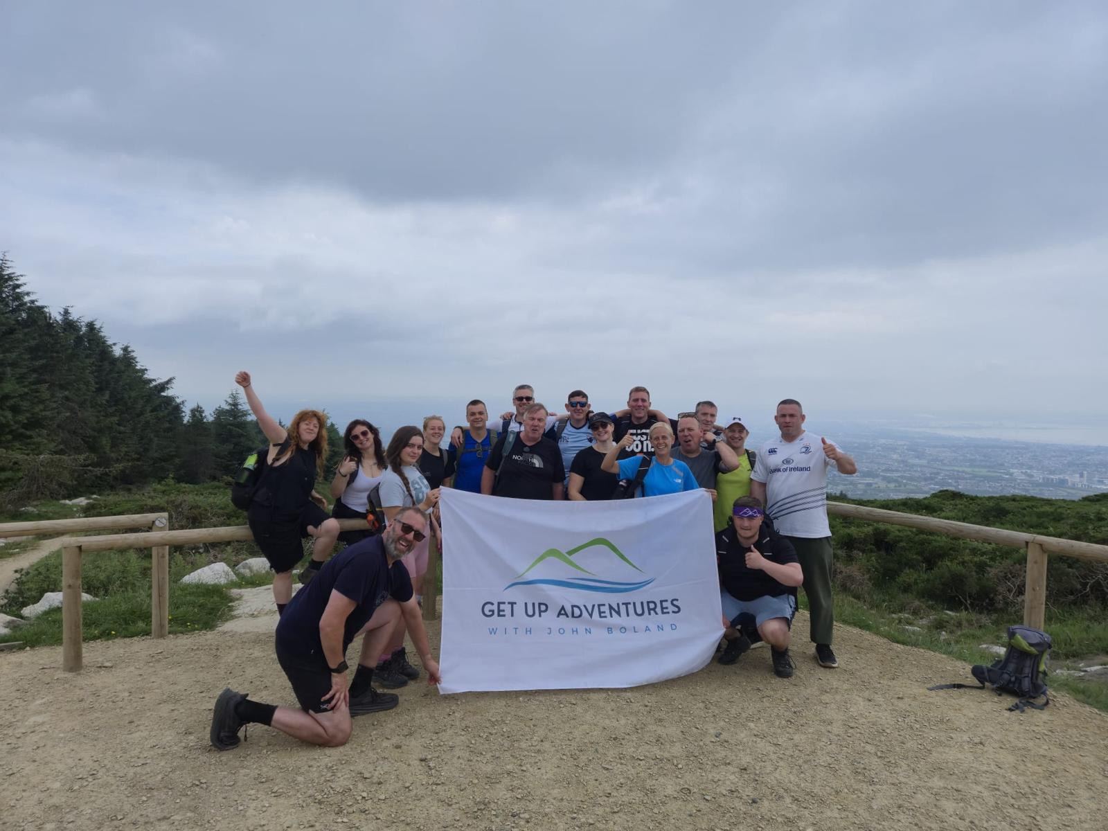 The whole group with the flag above Dublin